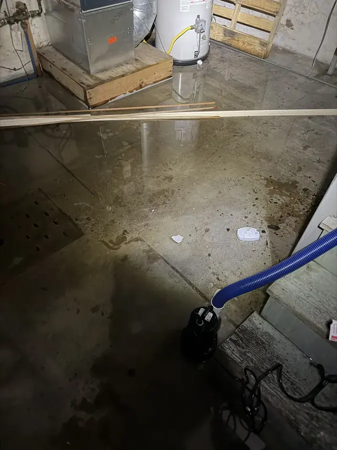 A technician checking a moisture reading in a Coachella Valley home