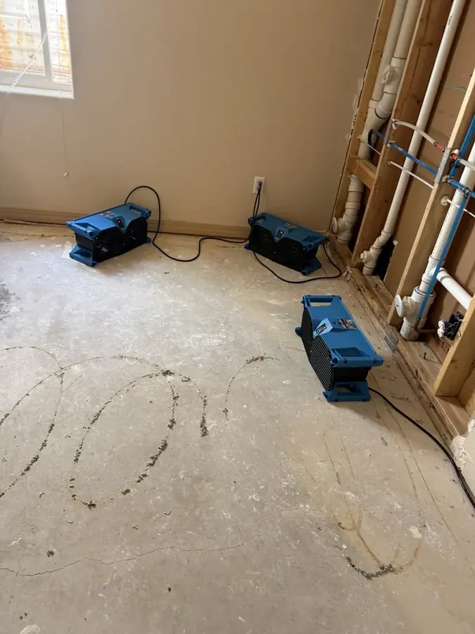 Drying equipment in a Rancho Mirage home after a burst pipe